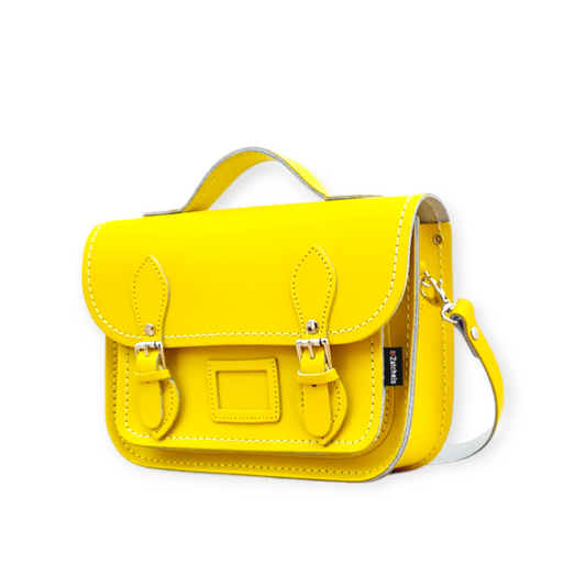 Elegant 9-inch pastel daffodil yellow leather midi satchel, showcasing luxurious craftsmanship and stylish design, perfect for any occasion.