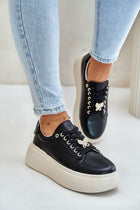 Elegant women's sneakers that look like dress shoes, crafted from premium materials featuring sleek designs, perfect for blending comfort with sophisticated style in any outfit.
