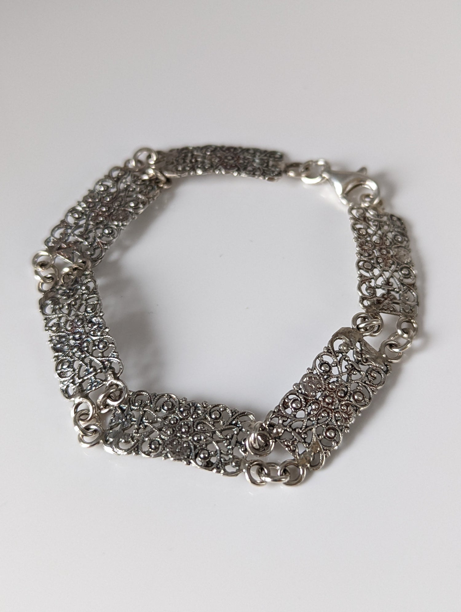 Elegant Silver Bracelet from the Silver Steed Collection showcasing exquisite craftsmanship and luxurious design features.