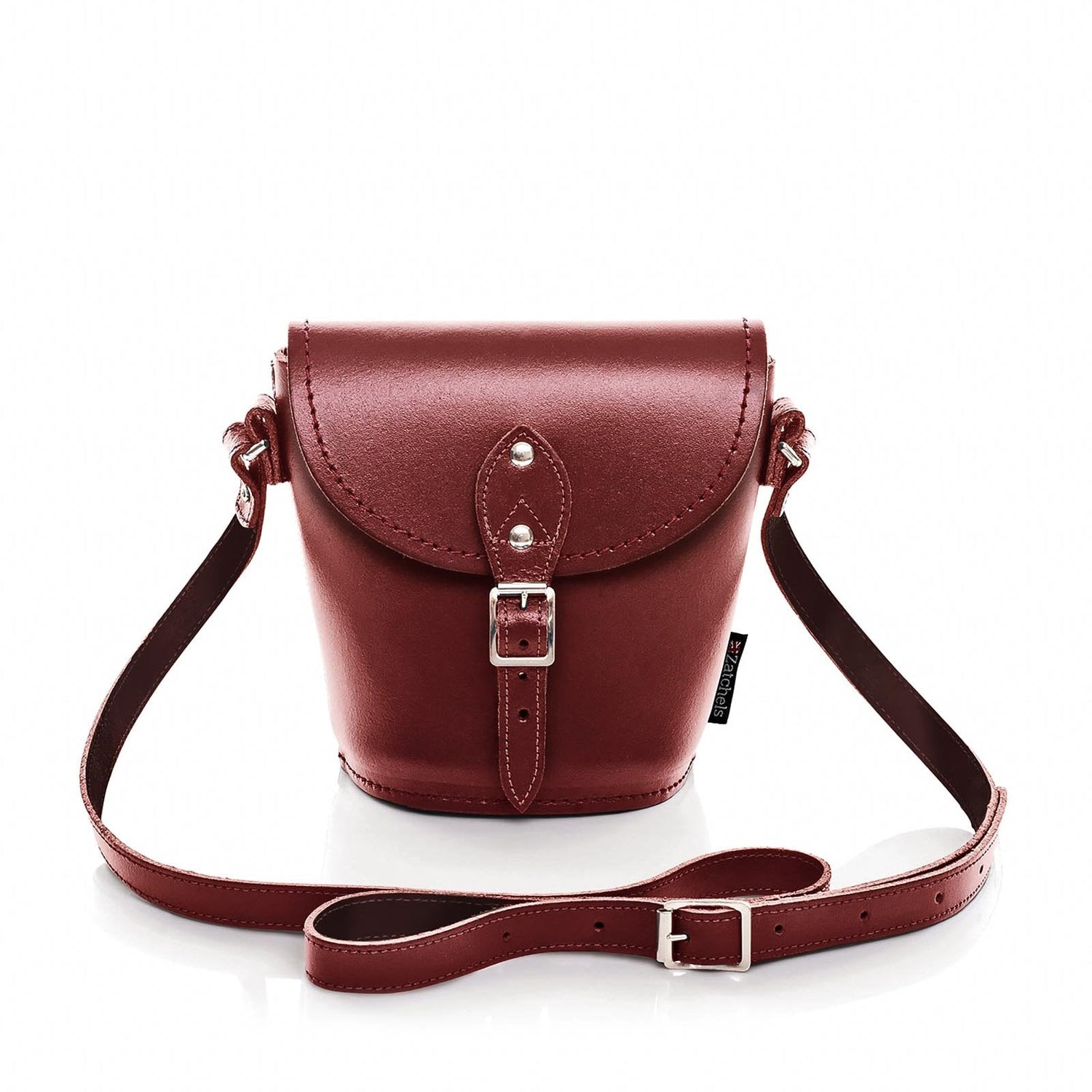 Luxury Handmade Oxblood Leather Barrel Bag with Adjustable Strap, ideal for personalised gifts. Explore exquisite Barrel Bags that combine elegance with practicality.