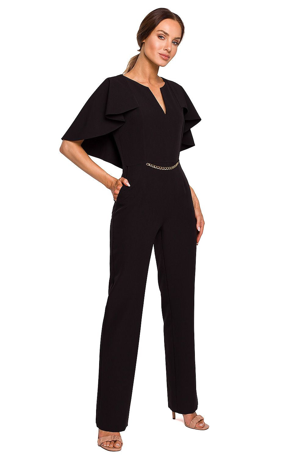 Elegant black pantsuit featuring a stylish cape detail and a chic chain accent, designed for a sophisticated and luxurious look.