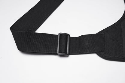 Lifestyle shot of the Punk Rave Tactical Goth Canvas Skull Waist-Leg Bag in an urban setting, perfect for festivals and edgy everyday wear, showcasing its versatility and punk style.