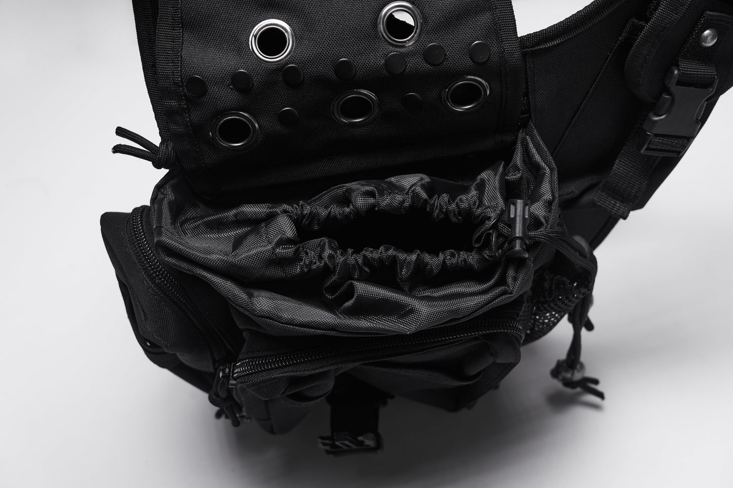 Stylish image of the Punk Rave Tactical Goth Canvas Skull Waist-Leg Bag highlighting adjustable straps for a secure fit, ideal for fashionable outdoor events and festivals.
