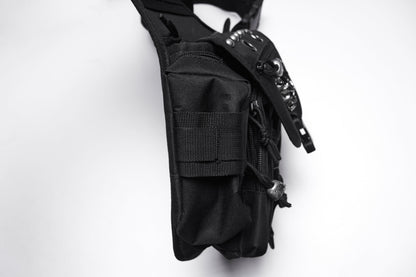 Close-up of the Punk Rave Tactical Goth Canvas Skull Waist-Leg Bag featuring heavy-duty rivets and a blend of punk aesthetics with practical storage, embodying luxury streetwear.