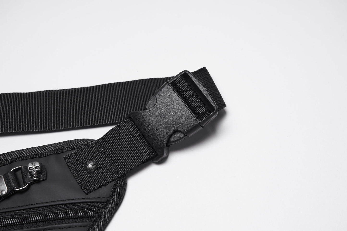 Model wearing the Punk Rave Cyberpunk Waist-Leg Bag in an urban setting, illustrating its versatility and luxury aesthetic for festival-goers.