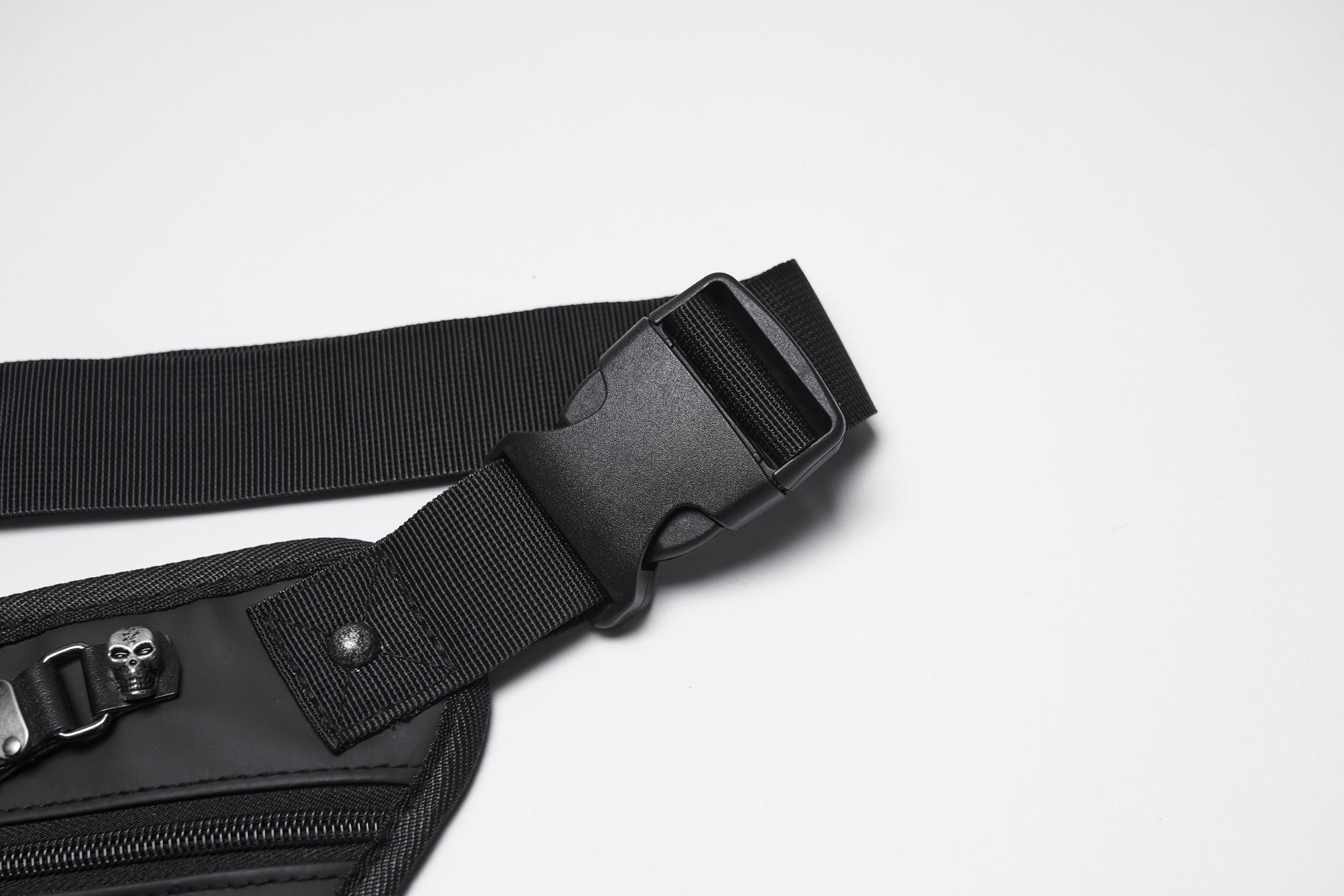 Model wearing the Punk Rave Cyberpunk Waist-Leg Bag in an urban setting, illustrating its versatility and luxury aesthetic for festival-goers.