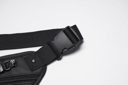 Model wearing the Punk Rave Cyberpunk Waist-Leg Bag in an urban setting, illustrating its versatility and luxury aesthetic for festival-goers.