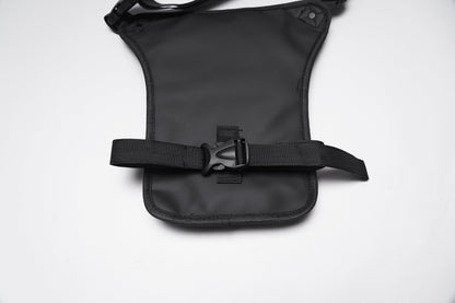 Close-up view of the Punk Rave Cyberpunk Waist-Leg Bag highlighting adjustable straps, spacious multi-pocket design, and bold industrial aesthetics for a luxurious yet rebellious style.