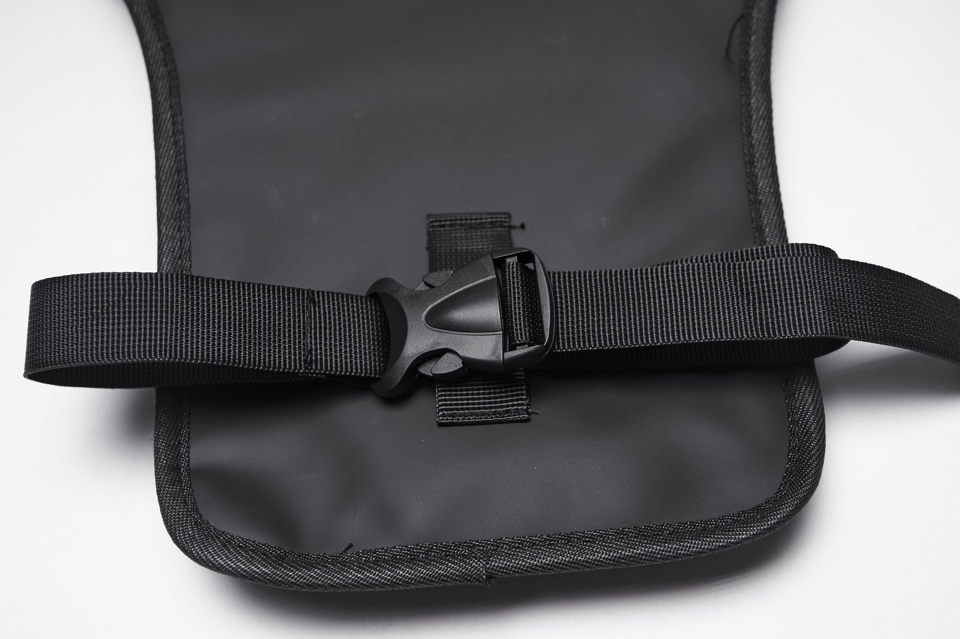 Stylish model displaying the Punk Rave Cyberpunk Waist-Leg Bag worn around the waist and thigh, combining utility and edgy fashion in a captivating urban setting.