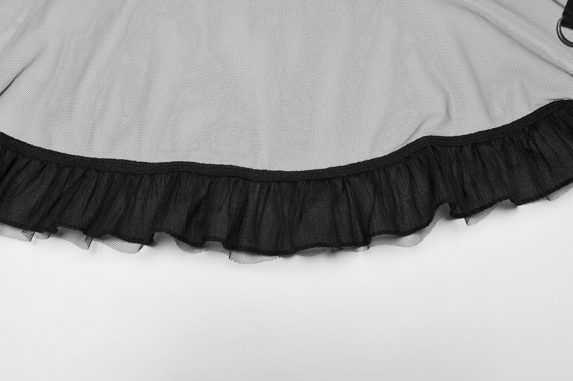 Full view of the dramatic high-low hemline and ruffled edges of the Punk Rave Morrigan skirt, illustrating its bold and edgy design.