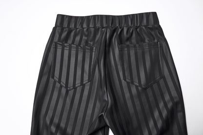 Model wearing Punk Rave Althea high-waisted leggings styled with vertical stripes and back patch pockets, demonstrating the luxurious fit and comfort in sizes ranging from F.XS to F.4XL.