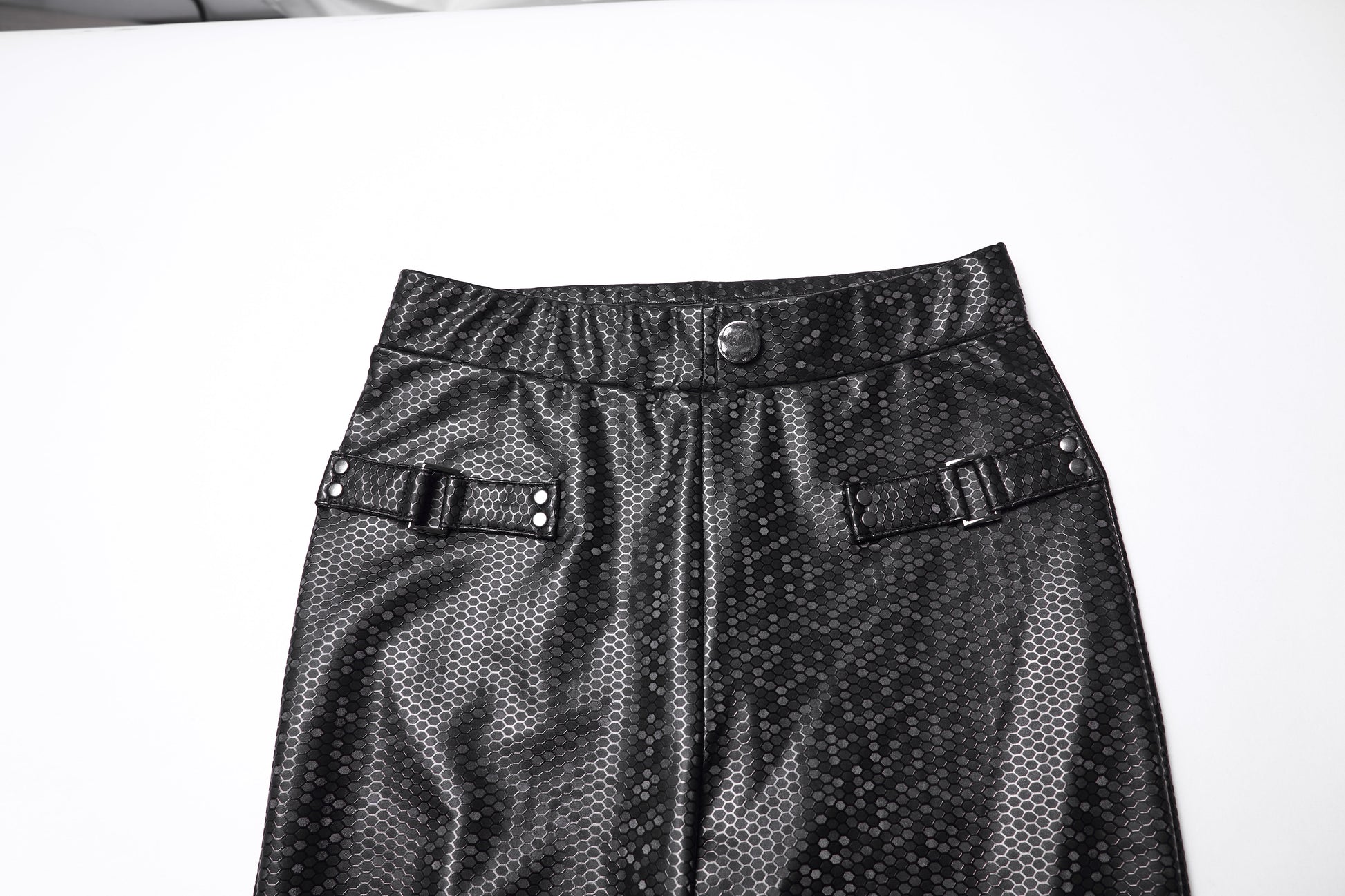 Side profile of the Punk Rave Ravenna Leggings displaying the fitted silhouette and buckle strap detailing, designed for a chic and modern aesthetic.