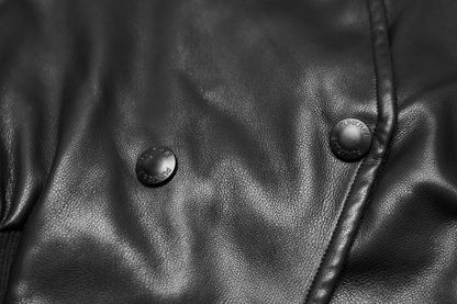 Luxurious Punk Rave Nyx Hooded Faux Leather Jacket with intricate skull studs, showcasing a dark gothic aesthetic and stylish oversized hood.