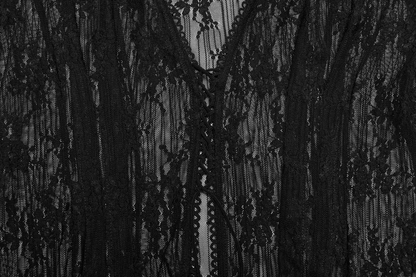 Model styled in the Punk Rave Tau Lace Cardigan, exhibiting a chic layered outfit ideal for sophisticated summer aesthetics.