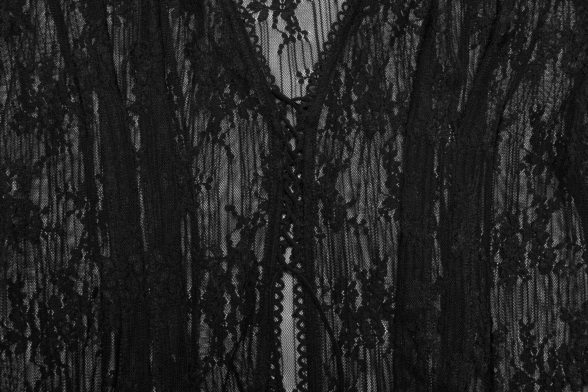 Model styled in the Punk Rave Tau Lace Cardigan, exhibiting a chic layered outfit ideal for sophisticated summer aesthetics.