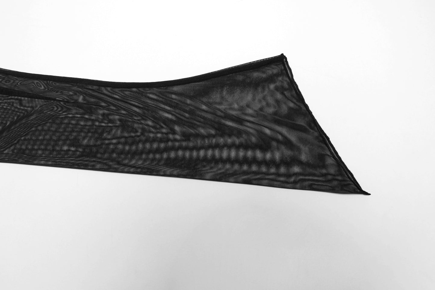 Punk Rave Tau Lace Cardigan elegantly draped on a hanger, demonstrating its sheer charm and graceful silhouette.