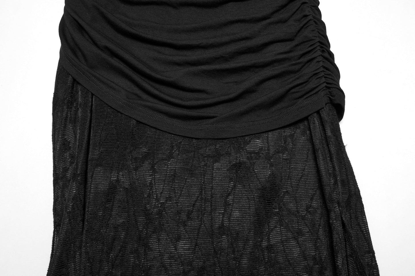 Artistic flat lay of the Punk Rave Arti Fishtail Skirt, displaying its luxurious fabric and unique design elements, ideal for a striking fashion statement.