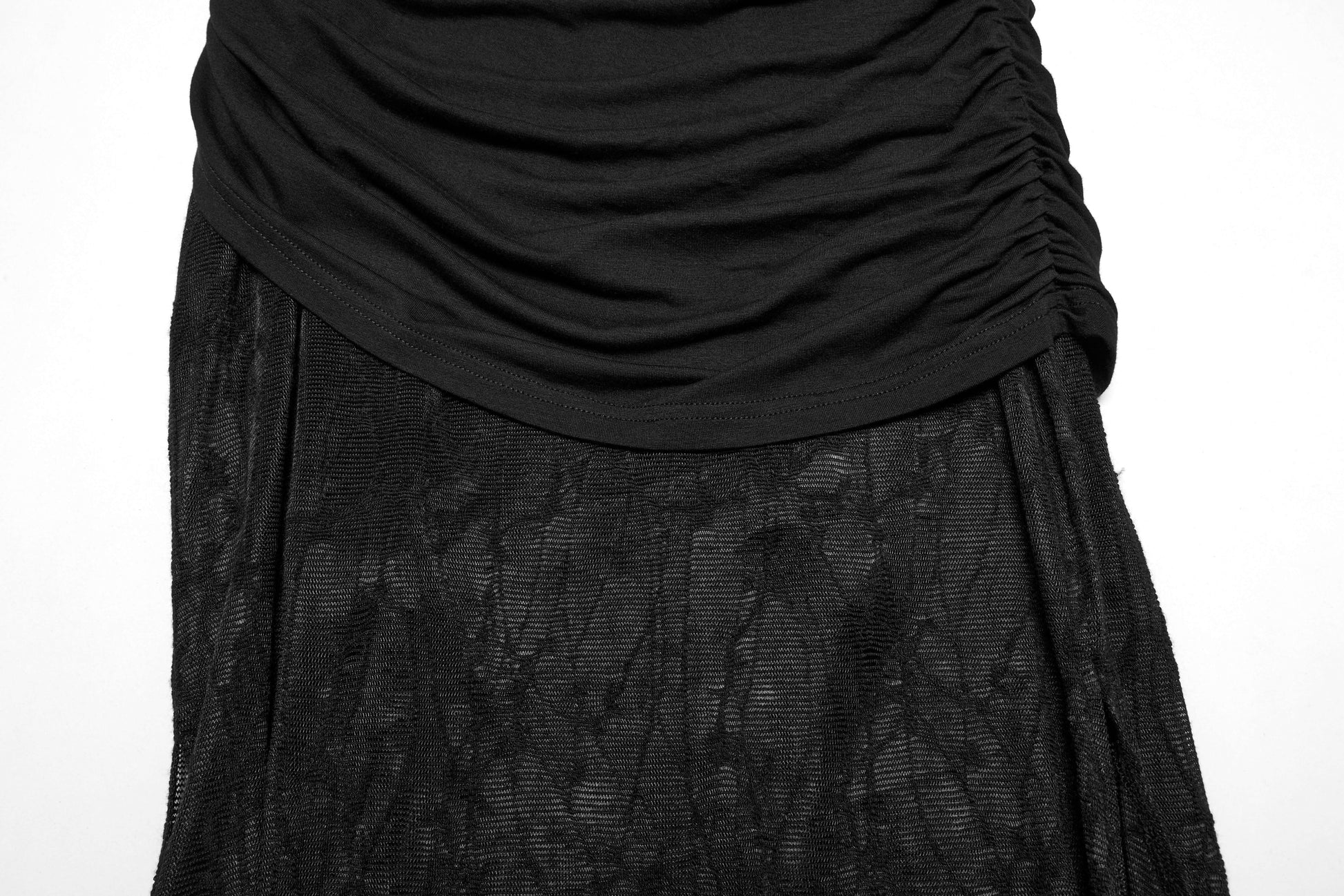 Artistic flat lay of the Punk Rave Arti Fishtail Skirt, displaying its luxurious fabric and unique design elements, ideal for a striking fashion statement.