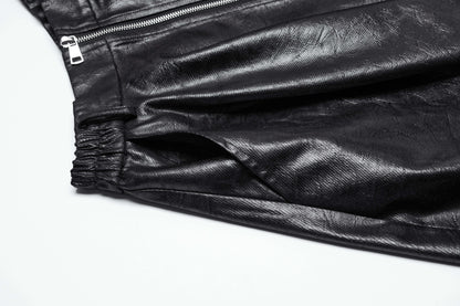 Detail image of the Punk Rave Myra skirt focusing on the irregular hemline and luxurious faux leather texture.