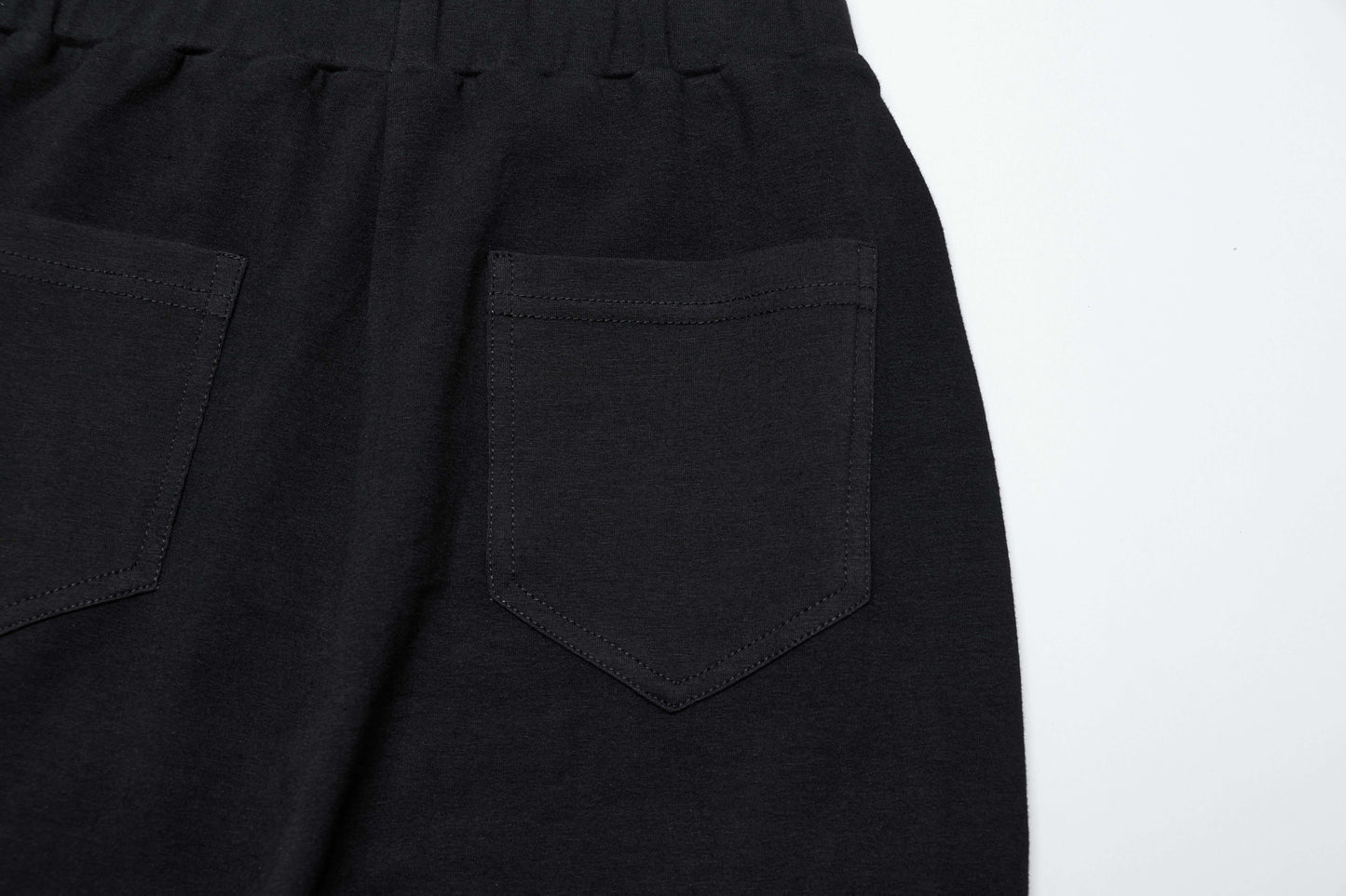 Model showcasing the flattering silhouette of the Punk Rave Veda flared pants, accentuating the feminine shape with a chic retro vibe.