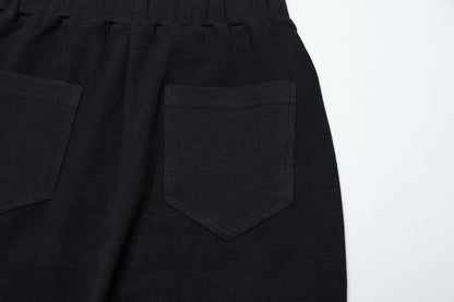 Model showcasing the flattering silhouette of the Punk Rave Veda flared pants, accentuating the feminine shape with a chic retro vibe.