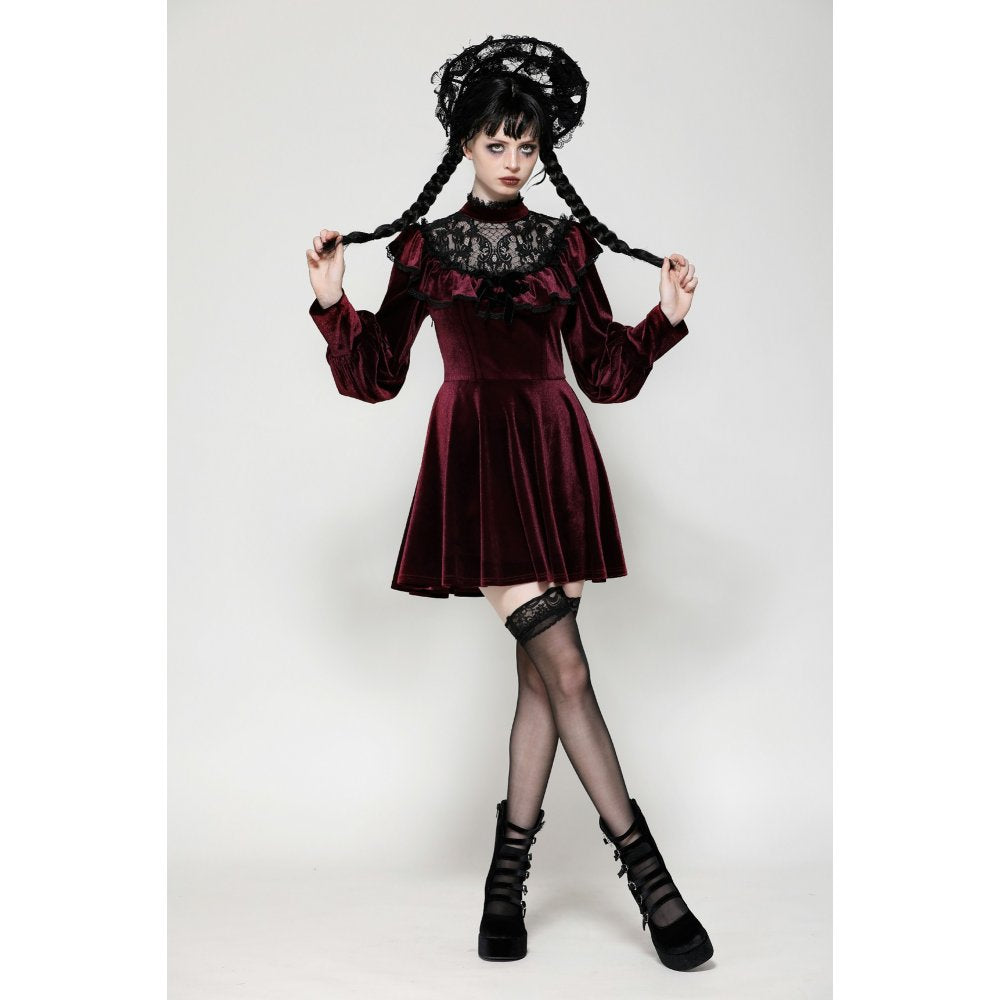 Full view of the burgundy velvet dress with a flowing silhouette, elegantly combined with gothic lace, exemplifying classic beauty and style.