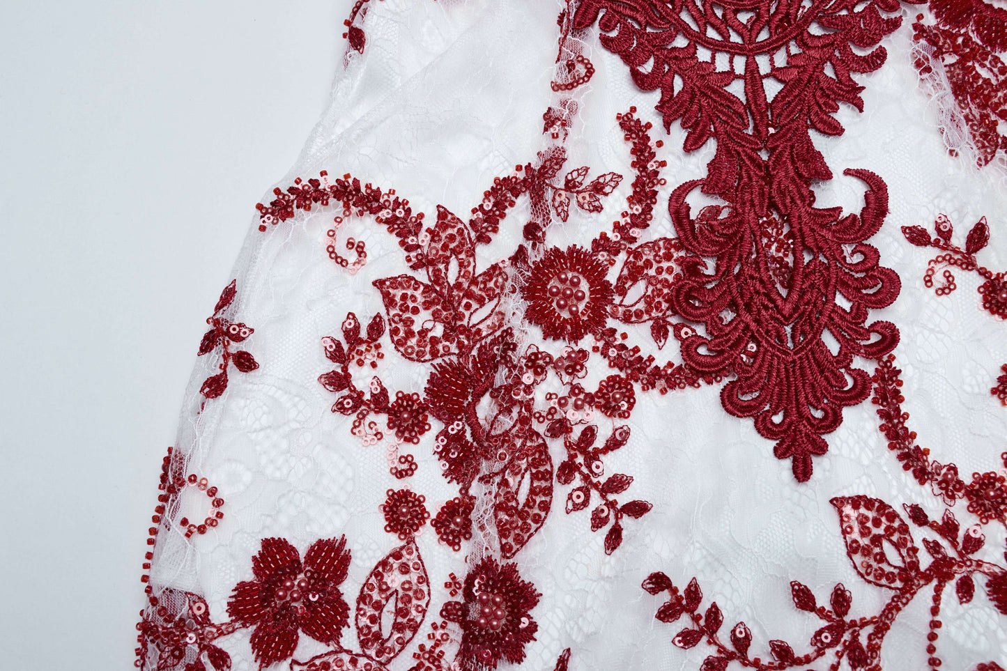 Close-up detail of the Gothic-style front decal on the Punk Rave Eladia Dress, showcasing its luxurious sequin floral design.