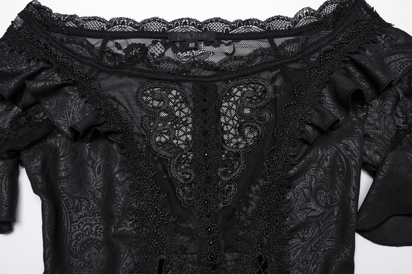 Close-up of the enchanting hollow applique on the Punk Rave Jezebel Elf Off Shoulder Dress, highlighting its delicate craftsmanship and luxurious texture.