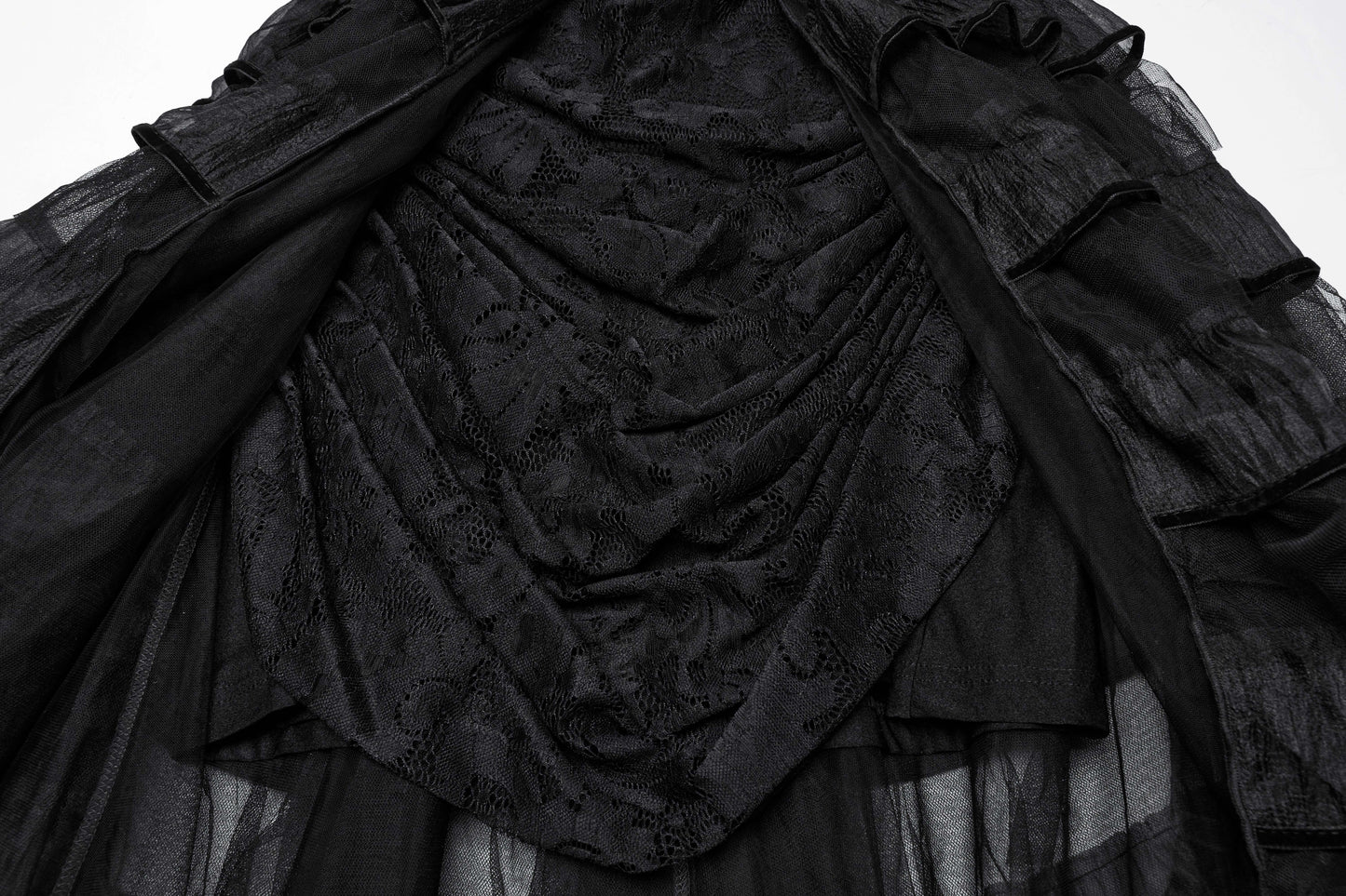 Elegant Punk Rave Penelope Steampunk Lace Dress featuring intricate lace design, ruffled chiffon mesh, and striking Gothic skull embellishments, styled with a romantic collar and pleated skirt.