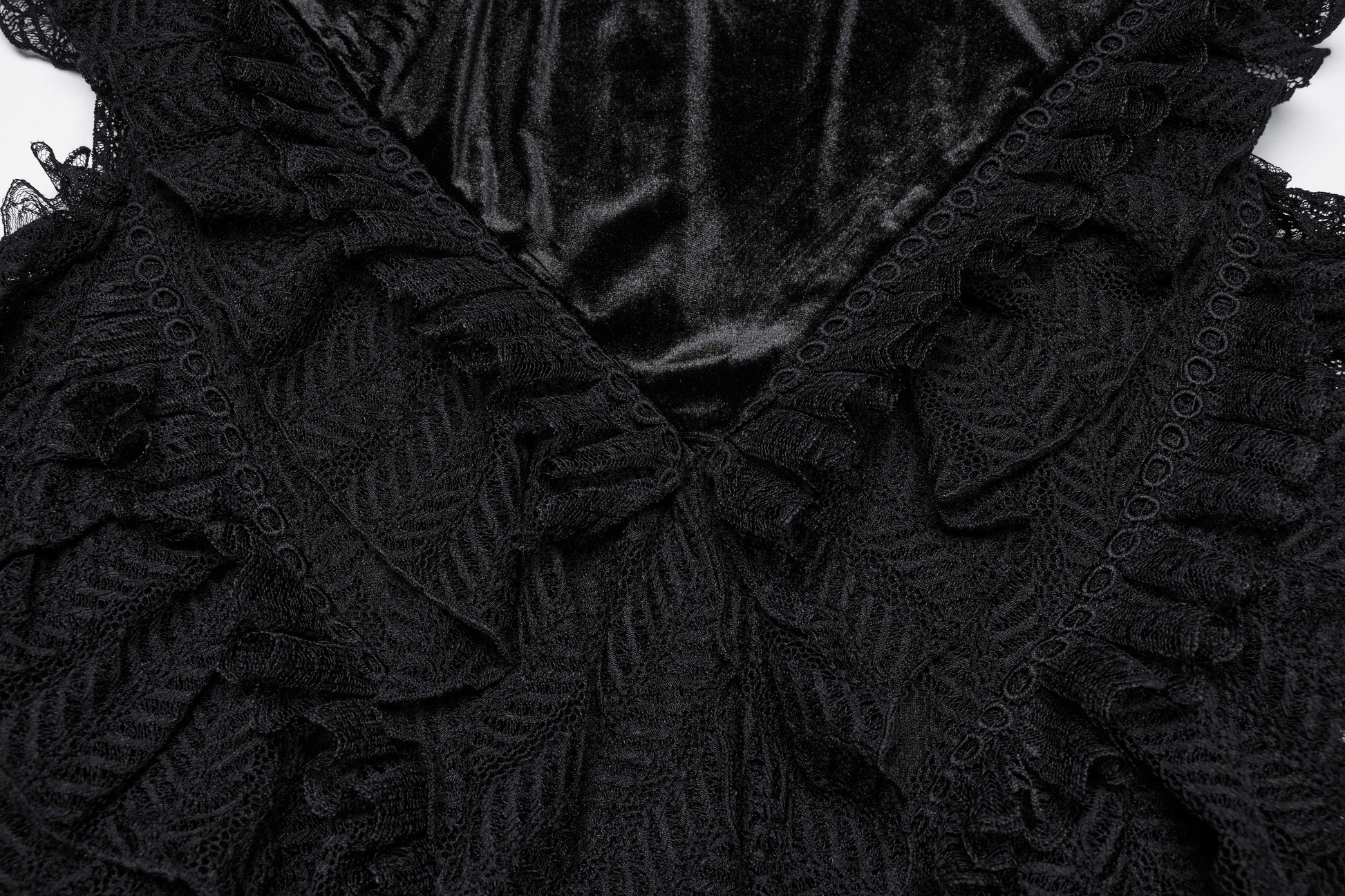 Back view of the Punk Rave Nera Goth Dynamic Skirt, highlighting its mesh ruffles and elegant silhouette for an alternative fashion statement.