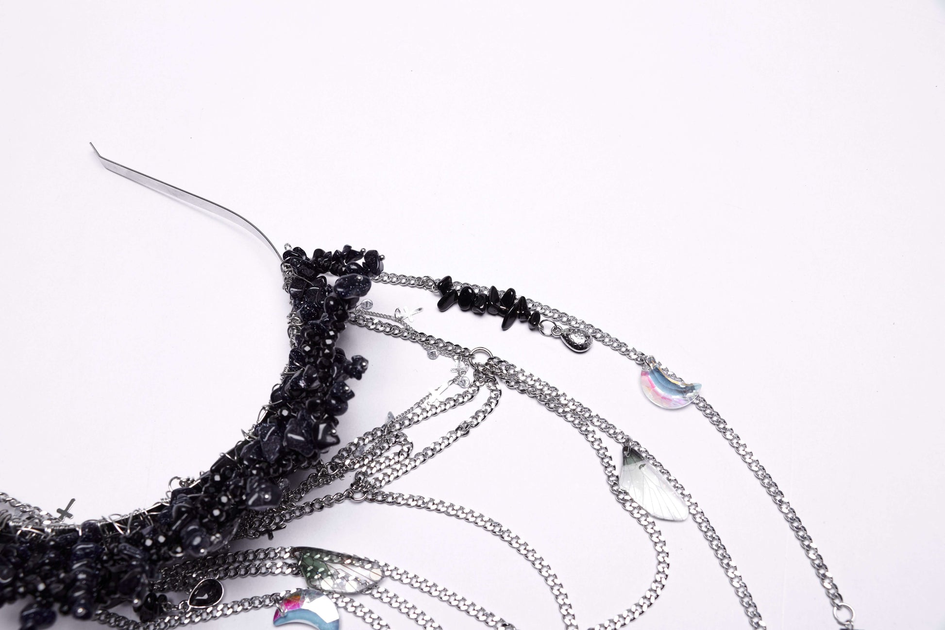 Stylish display of the Punk Rave Effie Headband with chain tassels, ideal accessory for adding a rebellious touch to any outfit.