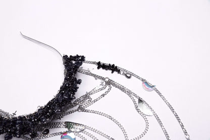 Stylish display of the Punk Rave Effie Headband with chain tassels, ideal accessory for adding a rebellious touch to any outfit.
