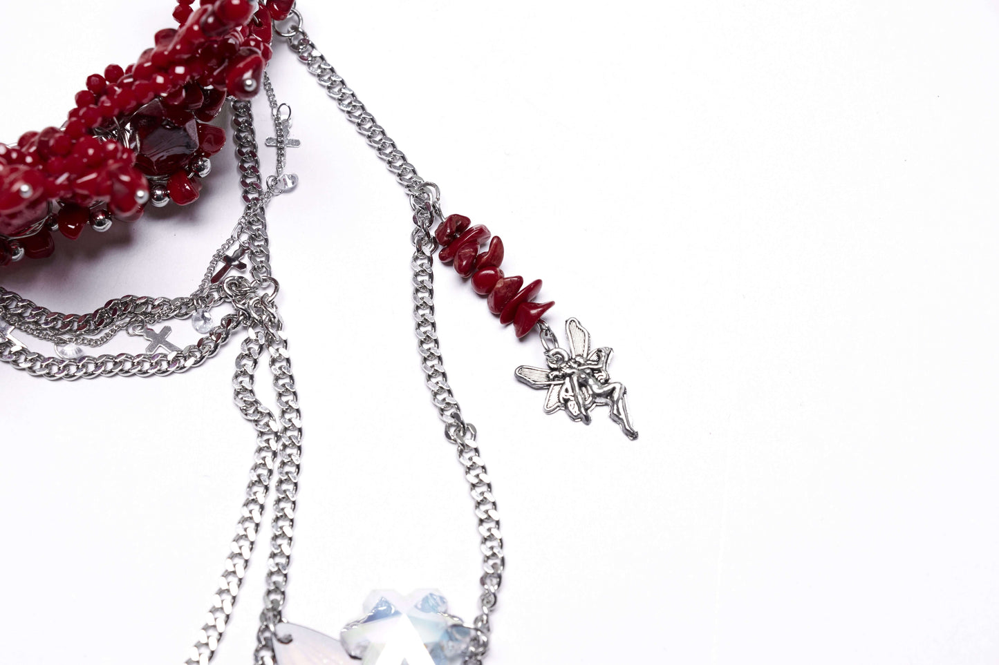 Model wearing the Punk Rave Effie Headband with crystal accents and chain tassels, illustrating the perfect fusion of royal style and rebellious charm.