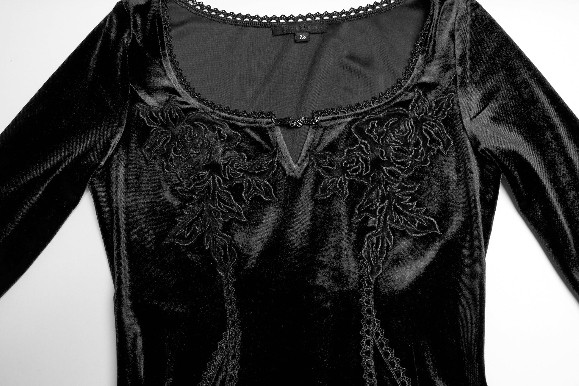 Full-length view of the Isolde black velvet dress, exemplifying luxurious gothic elegance with its flowing skirt and structured fit.