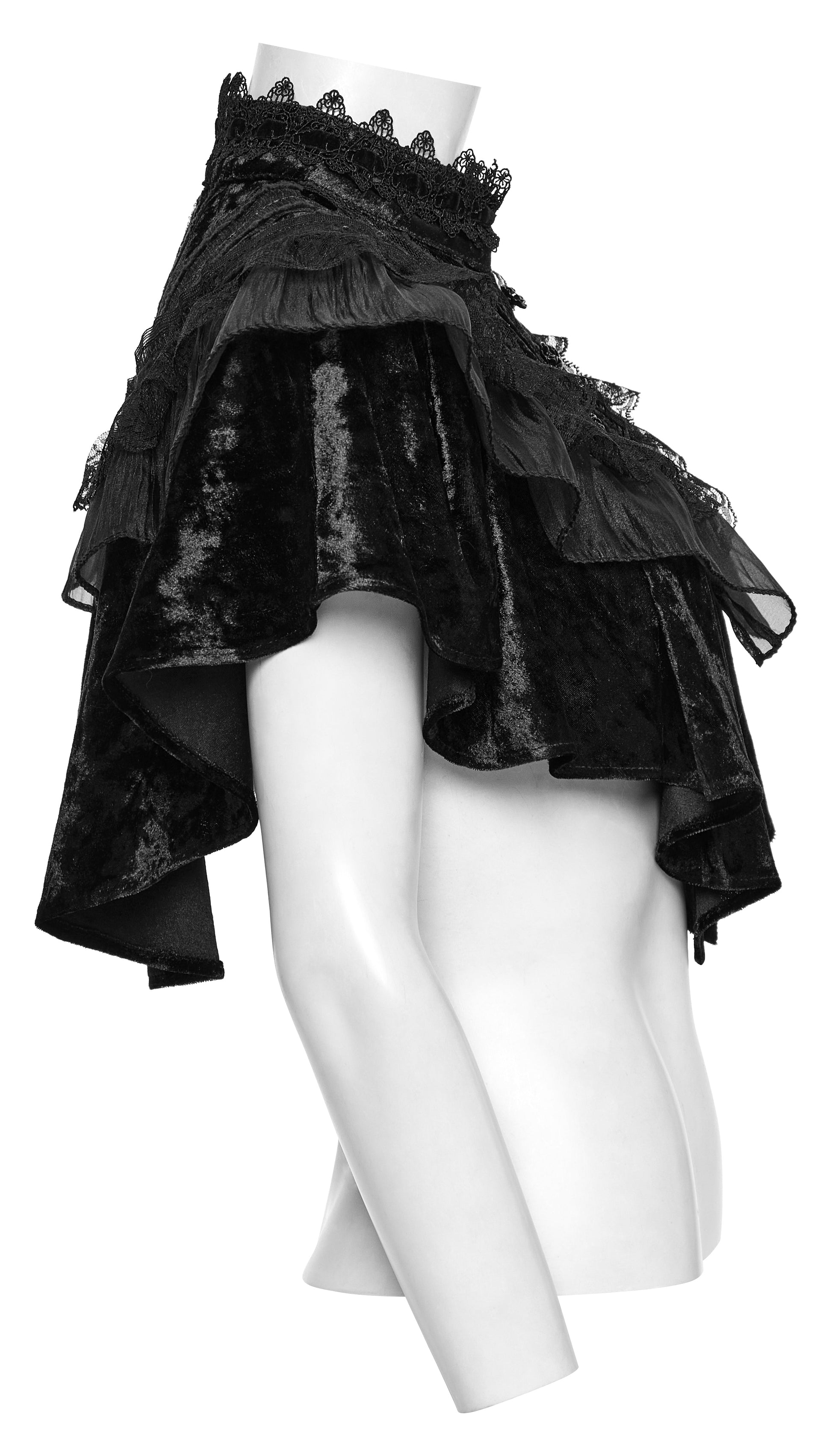 Ornate rose buckle closure on a black velvet goth shawl, embodying vintage romanticism.