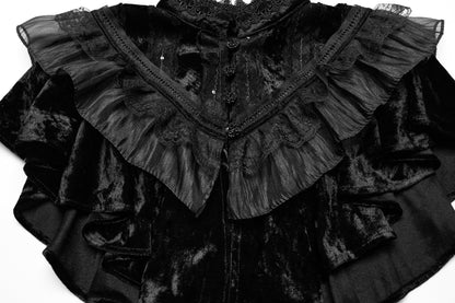 Versatile goth shawl showcased over a dress, illustrating its luxurious texture and layered design.