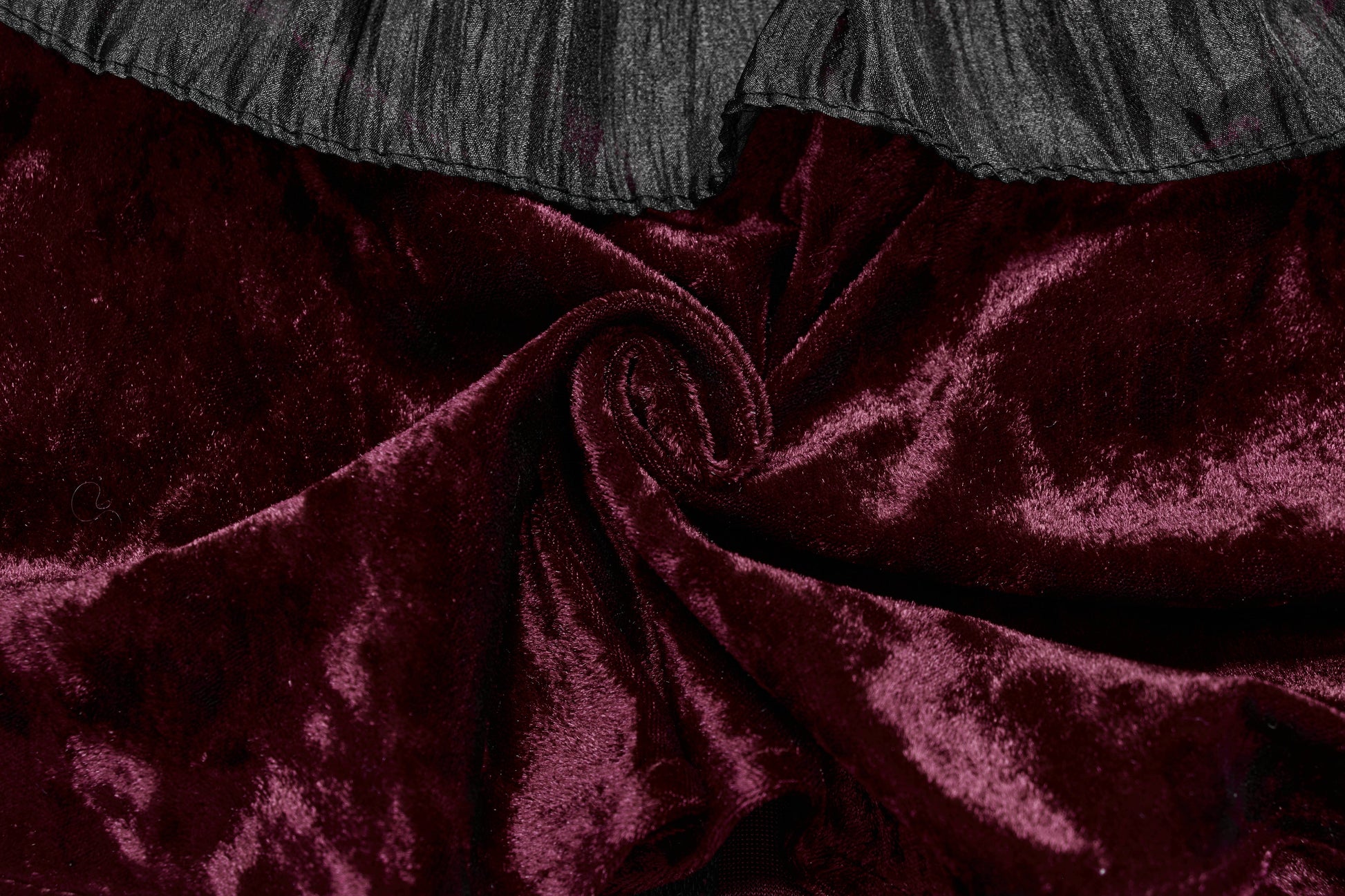 Punk Rave Elysia Crimson Velvet Ruffle Goth Shawl elegantly displayed on a mannequin, showcasing its rich crimson hue and intricate layered ruffle trim in contrasting black.