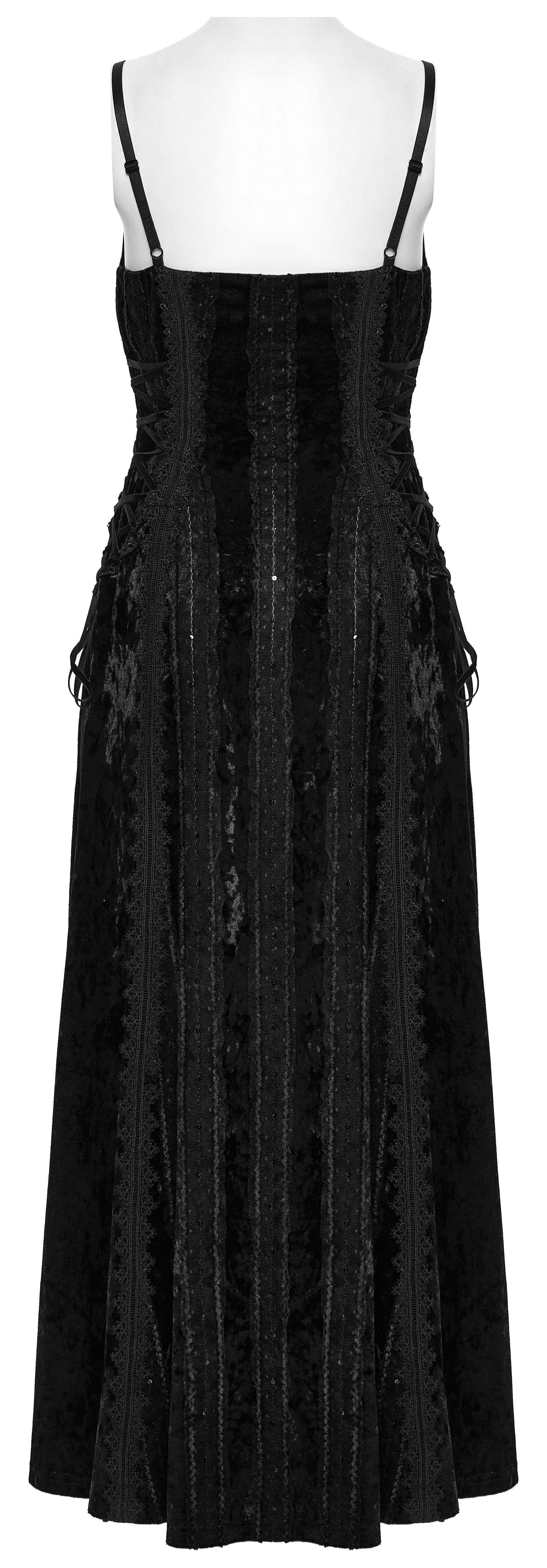 Model wearing the Punk Rave Morrigan Goth Slip Dress against a moonlit backdrop, highlighting the dress's luxurious velvet texture and adjustable fit.