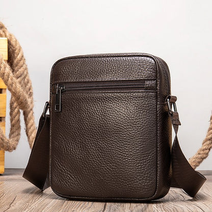 Dazzling Men's Genuine Leather Small Shoulder Bag with elegant litchi pattern in rich dark brown, perfect for sophisticated styling.