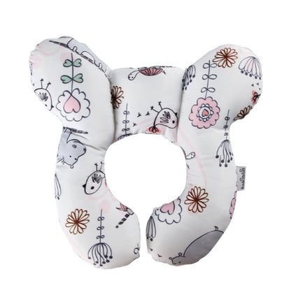 Elegant U-Shaped Infant Pillow adorned with whimsical floral patterns, ensuring comfort and support for your little one.