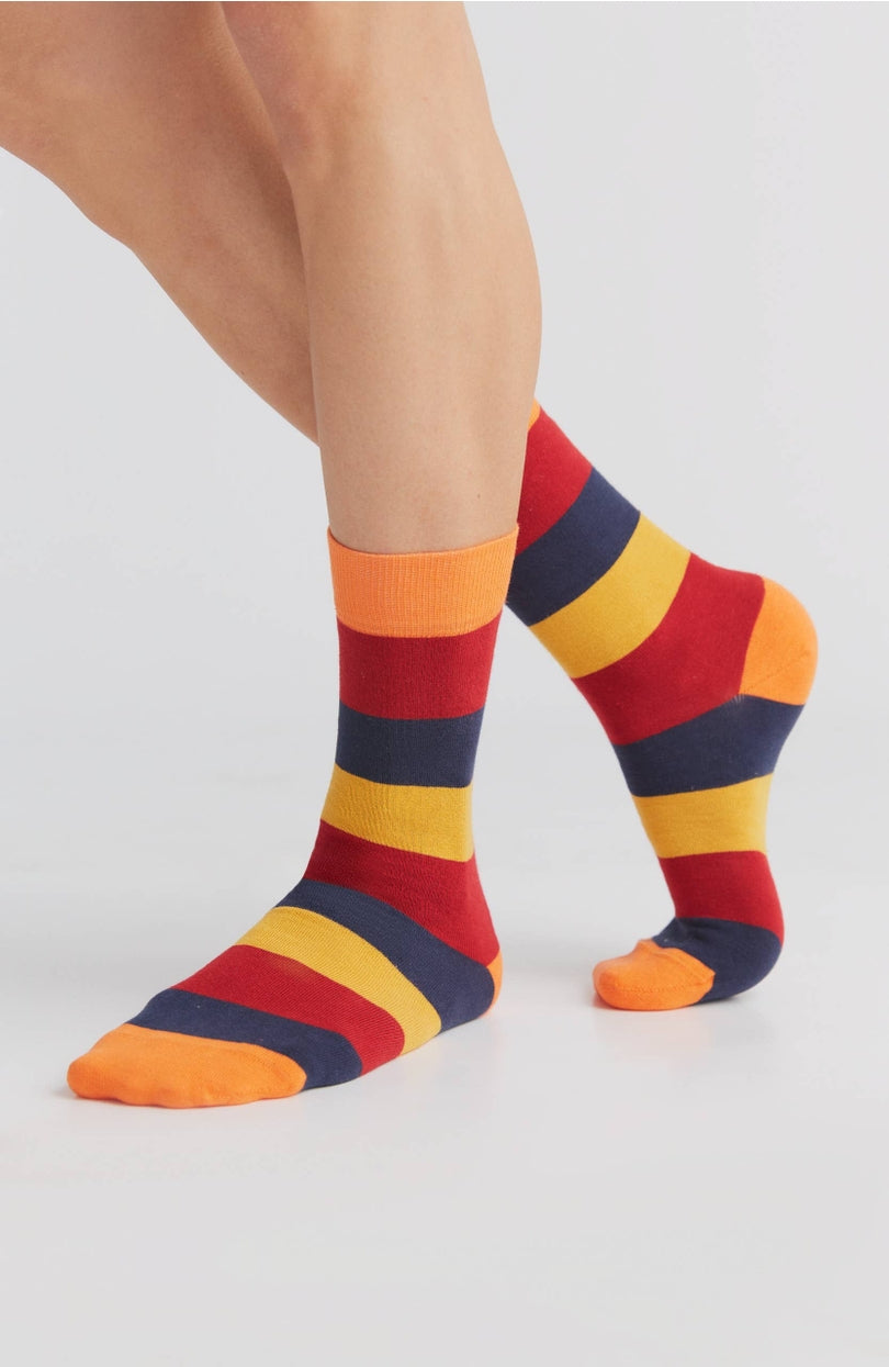 Close-up of luxury organic cotton socks featuring a smooth texture and fine elastane threads, demonstrating exceptional quality for perfect fit.