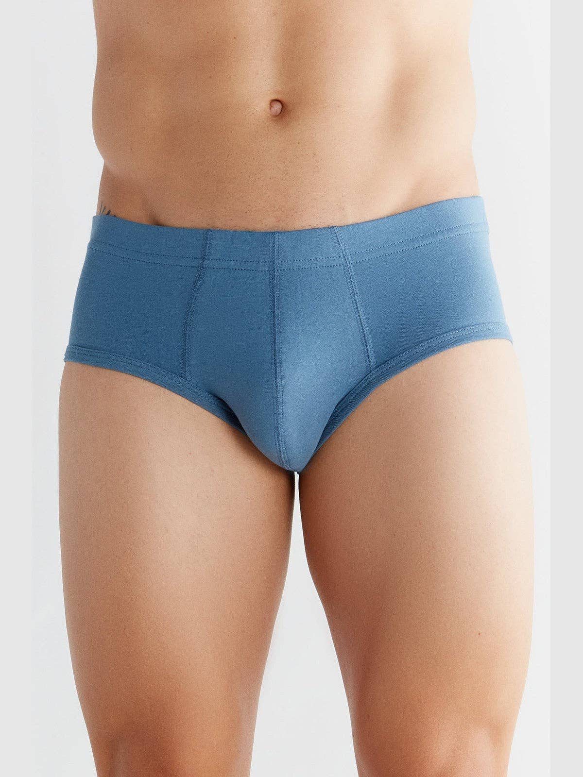 Close-up view of premium quality organic cotton briefs for men, showcasing the softness and durability of the fabric blend.