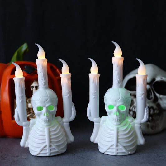 Elegant Halloween Skull Candlestick Lamp illuminating a spooky ambiance, featuring intricately designed skeleton body and flickering LED candle lights.
