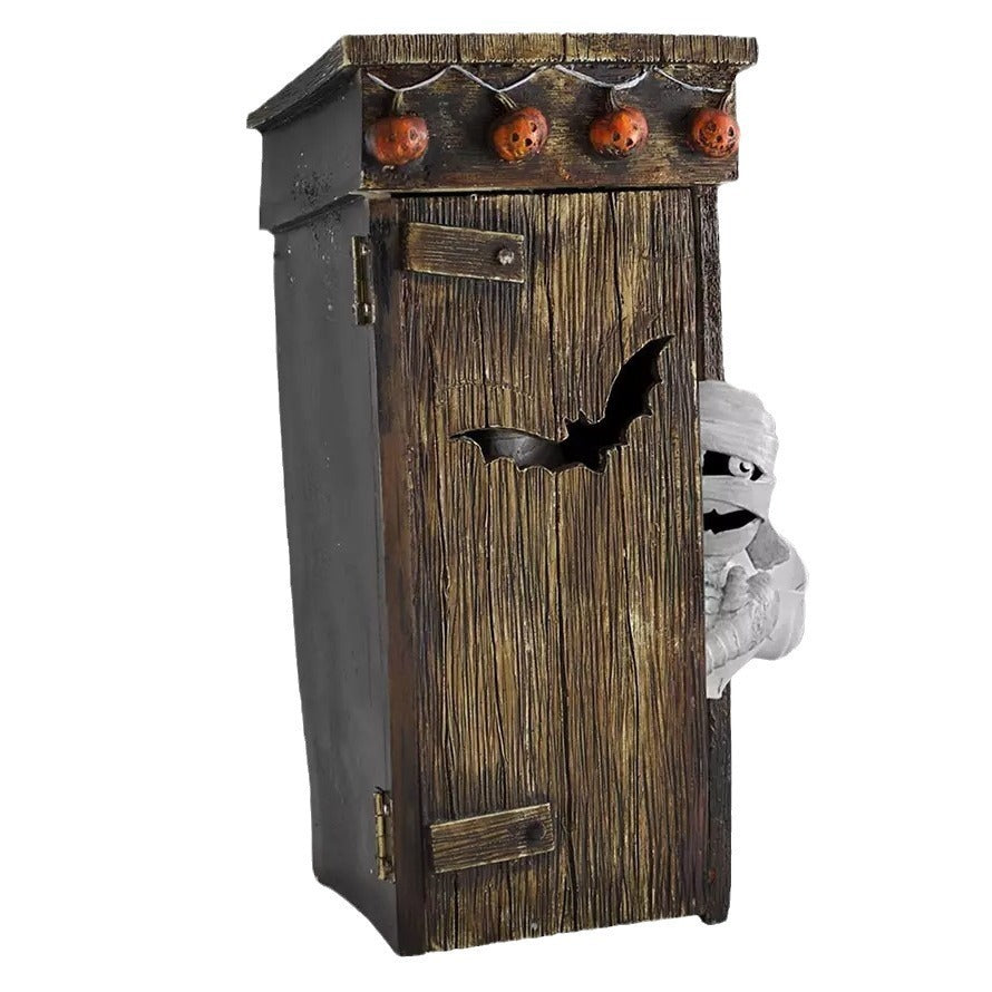 Spooky Outdoor Toilet Mummy Decoration - Detailed view showcasing a mummy lurking behind an intricately designed wooden toilet, complete with playful Halloween elements.