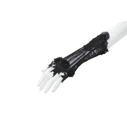Stylish model wearing Gothic lace fingerless gloves with ornate embroidery, adding a touch of glamour and luxury to any ensemble.