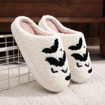 Sophisticated Funny Bat Slipper Halloween Pumpkin Flat Indoor House Shoes in white, artfully arranged on a grid, emphasising bat patterns for Halloween flair.