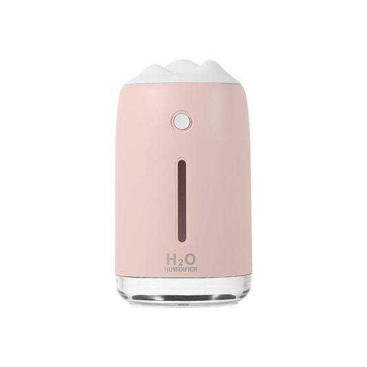 Xiaoxueshan Night Light Humidifier in elegant peach powder, a mini car air purifier designed for both style and functionality.
