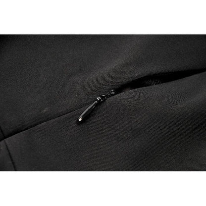 Elegant close-up of the Dark in Love Nyssa Black & Red Strap Detail Goth Mini Dress featuring intricate silver-tone eyelet detailing and an asymmetrical hem.