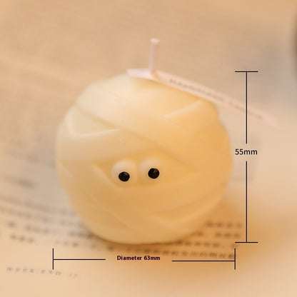 Elegant Halloween Scented Candle Set with a close-up detail of a white mummy candle, highlighting its dimensions and premium quality design, ideal for seasonal decor.