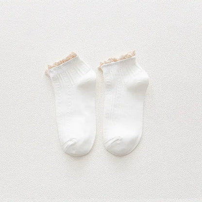 Close-up of the luxurious cotton fabric of Kawaii Frilly Ruffle Socks by Dazzling Dreams Studio, highlighting the softness and delicate ruffle design.